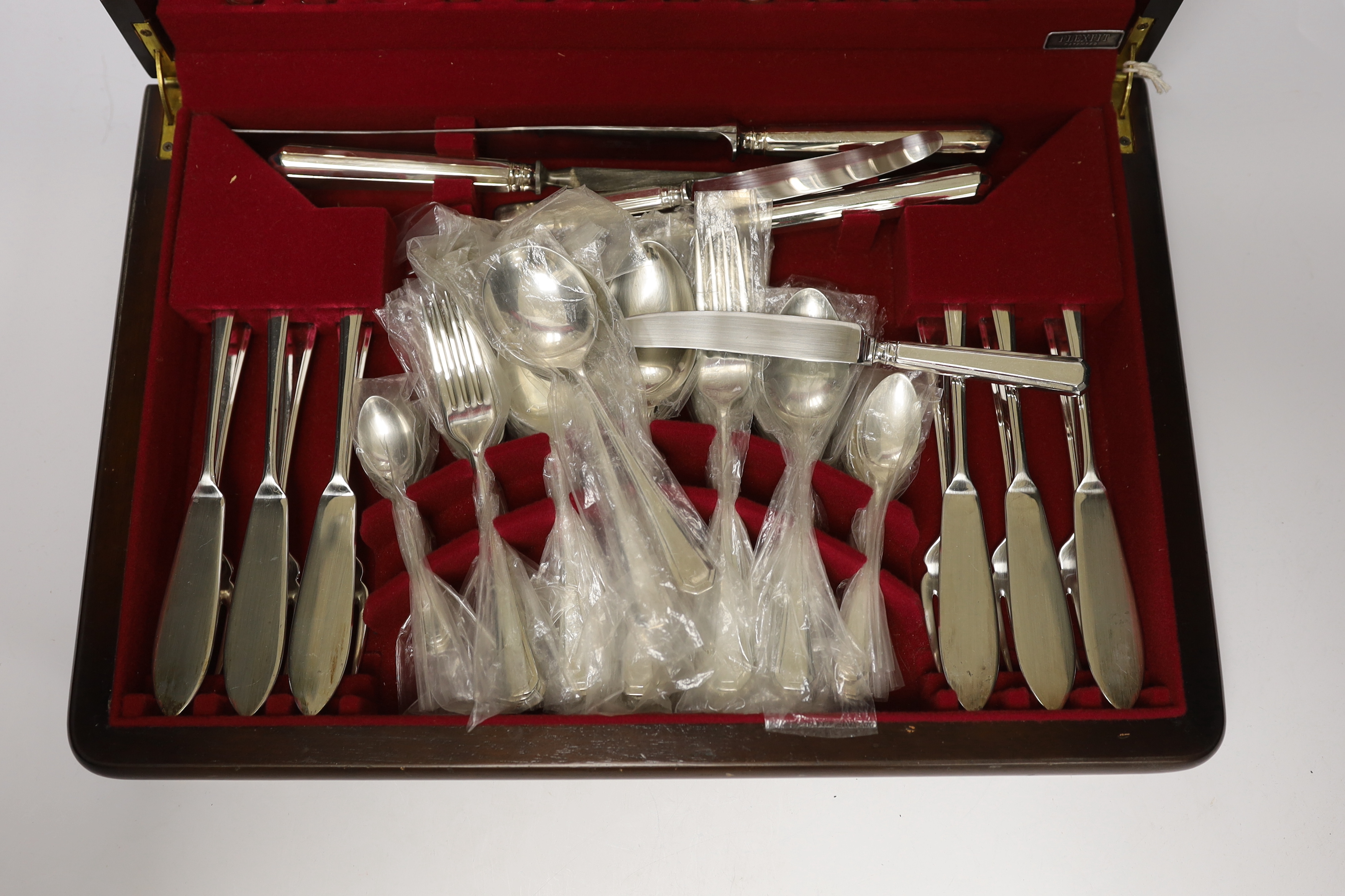 A canteen of silver plated cutlery, 47cm wide